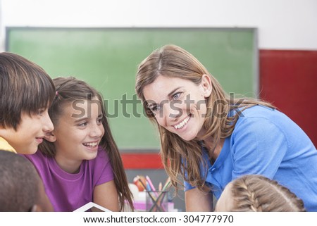 The teacher showing something