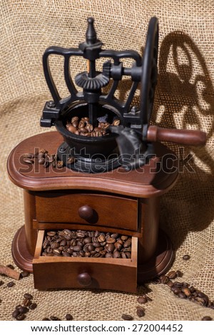 coffee beans, ground coffee, old wooden coffee grinder