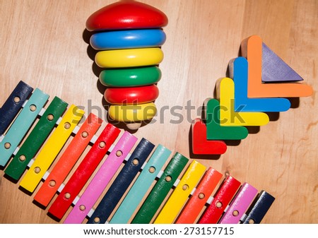 xylophone and a children\'s toy pyramid