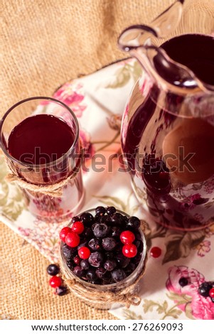 glass with berries and fruit compote