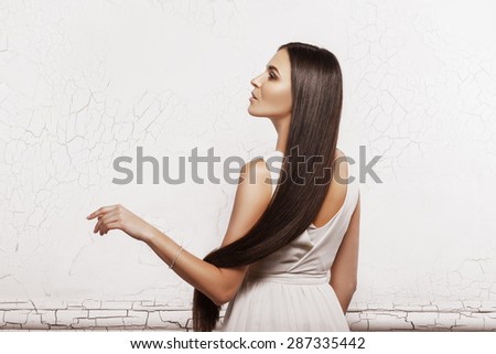 Portrait of a beautiful woman with long hair