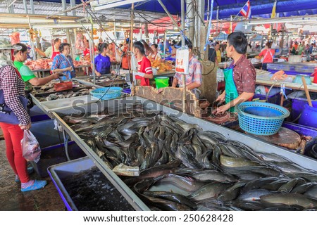 BANGKOK - FEB , 7 : The fish markets are crowned in holidays. There are many kind of fish . The seller just do the fish by order. THAILAND FEB , 7 2015