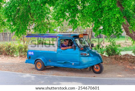 AYUDDHAYA - FEB,21: The vintage blue taxi of the old town is waitting for tourists. There are many color of taxi that is wellknown and good service.THAILAND FEB,21 2015