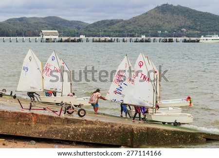 SATTAHEEP CHONBURI - MAY,12 : The group of sailing boats are pullinging up at the old port. After They practice for next completition. This is the nice view of sailing clubs.THAILAND MAY,12 2015