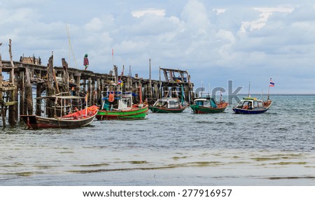 SATTAHEEP CHONBURI - MAY,14 : Fishing boats stand in the harbor To transport fish from the boat to the market. They are preparing supply and food before go out to the sea. THAILAND MAY,14 2015