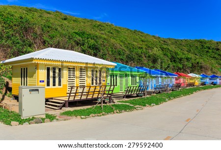 colorful guest house hut in-line in  nature background and blue sky day
