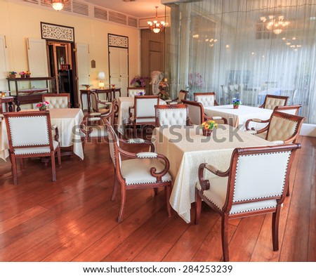 BANGKOK - JUNE,4 :The classic table and nice chairs for dinner set of royal Thai Navy interior indoor is decorated for visitor everyday where named \