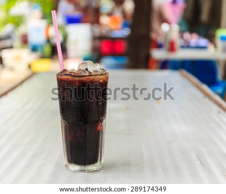 ice black coffee in glass in Thai style