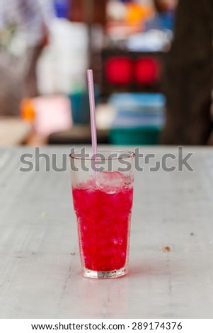 ice red sweet drink in glass in Thai style