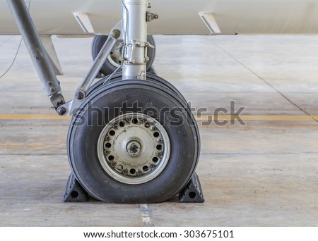 SATTAHIP CHONBURI - AUGUST,6 : Airplane wheel on the ground are in area of open air museum of The Royal Thai Navy.THAILAND AUGUST,6 2015
