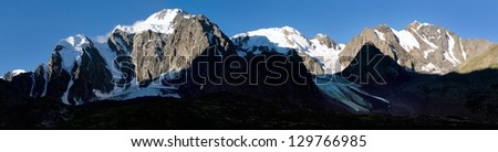 evening view of panoramic view of savlo rock face - altai range - mountains russia