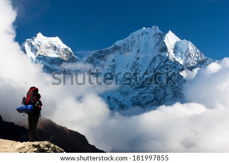Kangtega and Thamserku with tourist - beautiful mounts above the Namche Bazar on the way to Everest Base Camp - Nepal