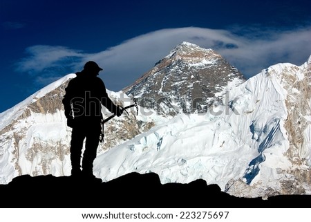 Mount Everest and silhouette of man - trek to everest base camp - Nepal