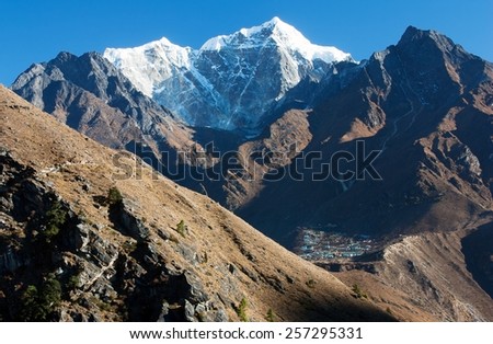 View of Portse village, mount cholatse and Tabuche peak - way to Everest base camp - Sagarmatha national park - Nepal