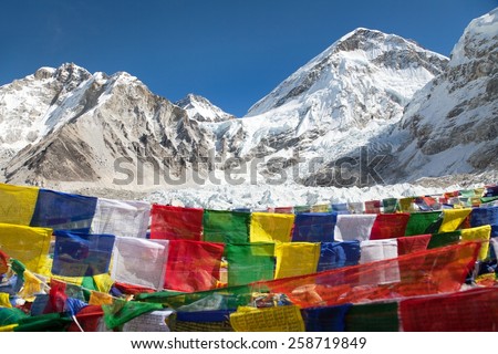 view from trek to Mount Everest base camp with rows of buddhist prayer flags - Khumbu valley - Sagarmatha national park - Nepal