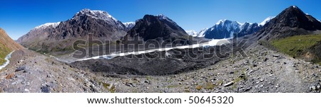 panoramic view of masej valley and masej rock face - altai mountains russia