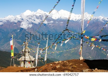 view from Langtang to Ganesh Himal with stupa and prayer flags - Nepal