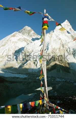 view of Everest with buddhist prayer flags from kala patthar