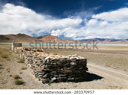 Beautiful landscape in Rupshu valley near Moriri lake and lake Kar with prayer mani walls, Ladakh, Jammu and Kashmir, India