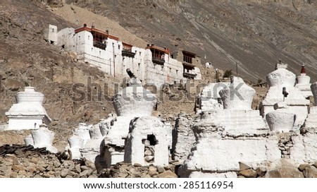 Ruins of royal palace with white buddhist stupas in Tiger or Tiggur village in Nubra valley, Ladakh, Jammu and Kashmir, India - Nubra valley was old kingdom in Karakoram mountains