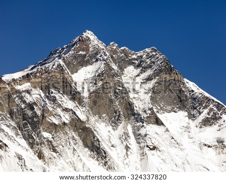 View of top of Lhotse, South rock face - Way to Everest base camp, three passes trek, Everest area, Sagarmatha national park, Khumbu valley, Nepal