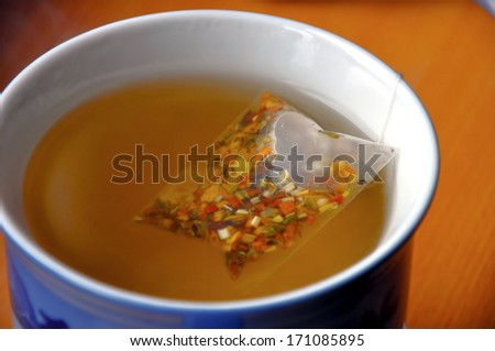 Close up of luxury tea bag in cup