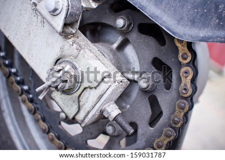 Motorcycle chain and wheel