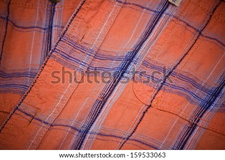 Orange shirt with blue lines texture
