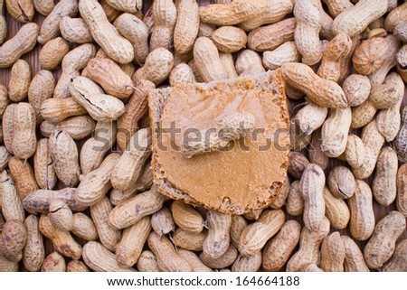 Peanut and butter on slide of bread food texture