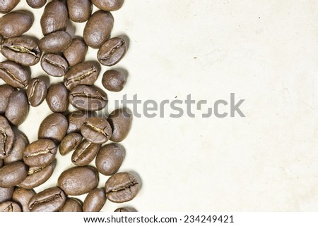 Stained paper with coffee seeds.