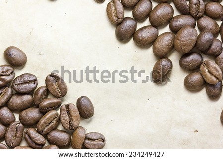 Stained paper with coffee seeds.