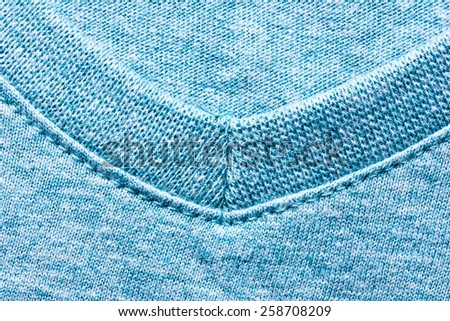 Blue shirt collar closeup fabric texture.