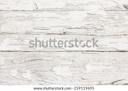 Grunge peeling white paint wood texture.