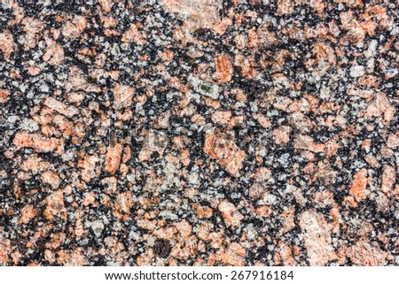 Red granite mineral texture.