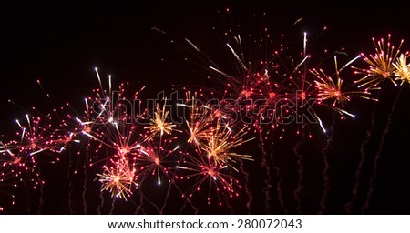 big firework with red and yellow sparks