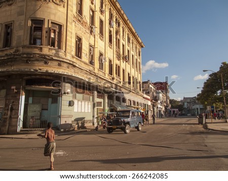 HAVANA, CUBA - DECEMBER 12, 2012: Unidentified people on the street of Havana, Cuba. Havana is the capital city, province, major port, and leading commercial centre of Cuba.