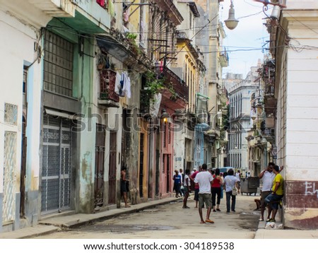 HAVANA, CUBA - MAY 20, 2012: Unidentified people on the street of Havana, Cuba. Havana is the capital city, province, major port, and leading commercial centre of Cuba.
