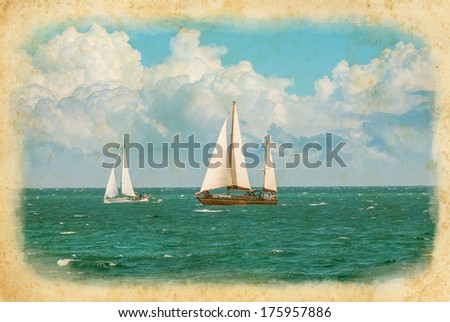 Cruising yachts are racing of regatta sailing. Nautical landscape with two yacht under full sail taking part in regatta race. Maritime romantic trip on the sailing yacht.