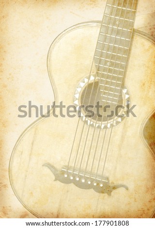 Grunge background with guitar for music design. Old guitar on vintage paper texture.