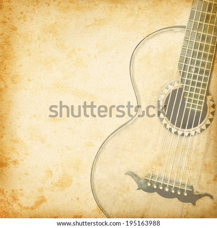 Grunge background with guitar for music design. Old guitar on vintage paper texture.