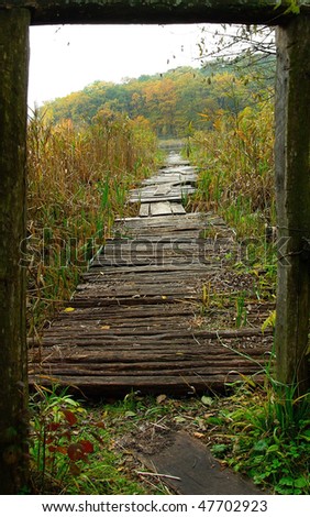 Wooden pathway plank - the road to infinity, path to nowhere