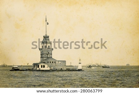 Seascape with Maiden\'s Tower in Istanbul. Maidens Tower - turkish historical landmarks. Ancient tower and lighthouse at Strait of Bosphorus, horizontal old photo in retro style.
