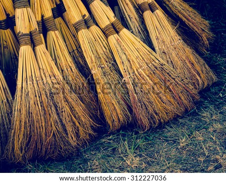 Group of brooms - home housecleaning equipment.