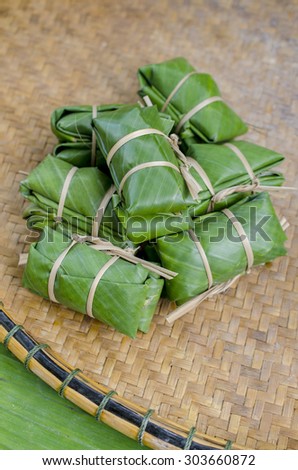 Glutinous rice steamed in banana leaf (thai dessert)