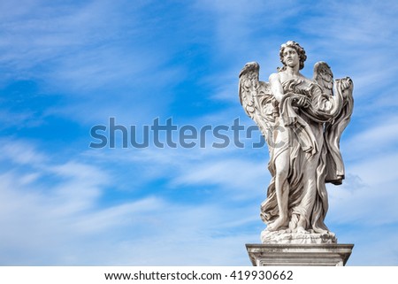 Angel statue by Bernini along Sant\'Angelo bridge in Rome