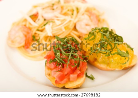 Shrimp pasta with garlic butter sauce with bruchetta