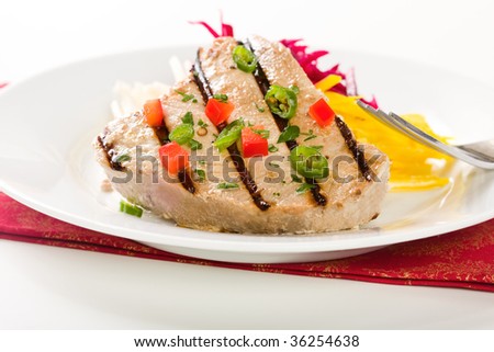 Jalapeno marinated grilled tuna steak with beet and jicama slaw