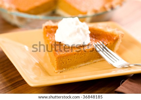 Sweet Potato Pie with a dollop of freshly whipped cream