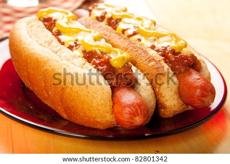 Perfect for the big game,  picnic, party or anytime, chili cheese dogs with mustard and onions