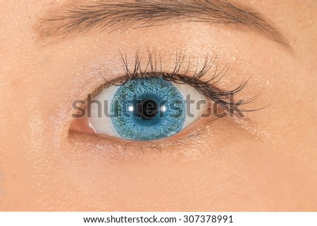Blue colored contact lenses and eyelashes extension Asian
